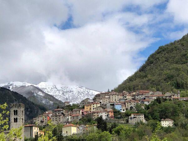 View of the Tuscan mountain village of Vico Pancellorum from the foothills. View of the Tuscan mountain village of Vico Pancellorum from the foothills.